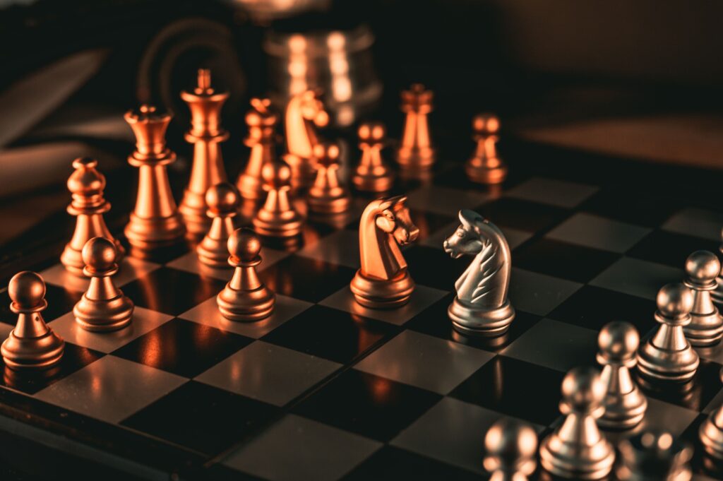 Closeup of the chess pieces on the board. Knights.