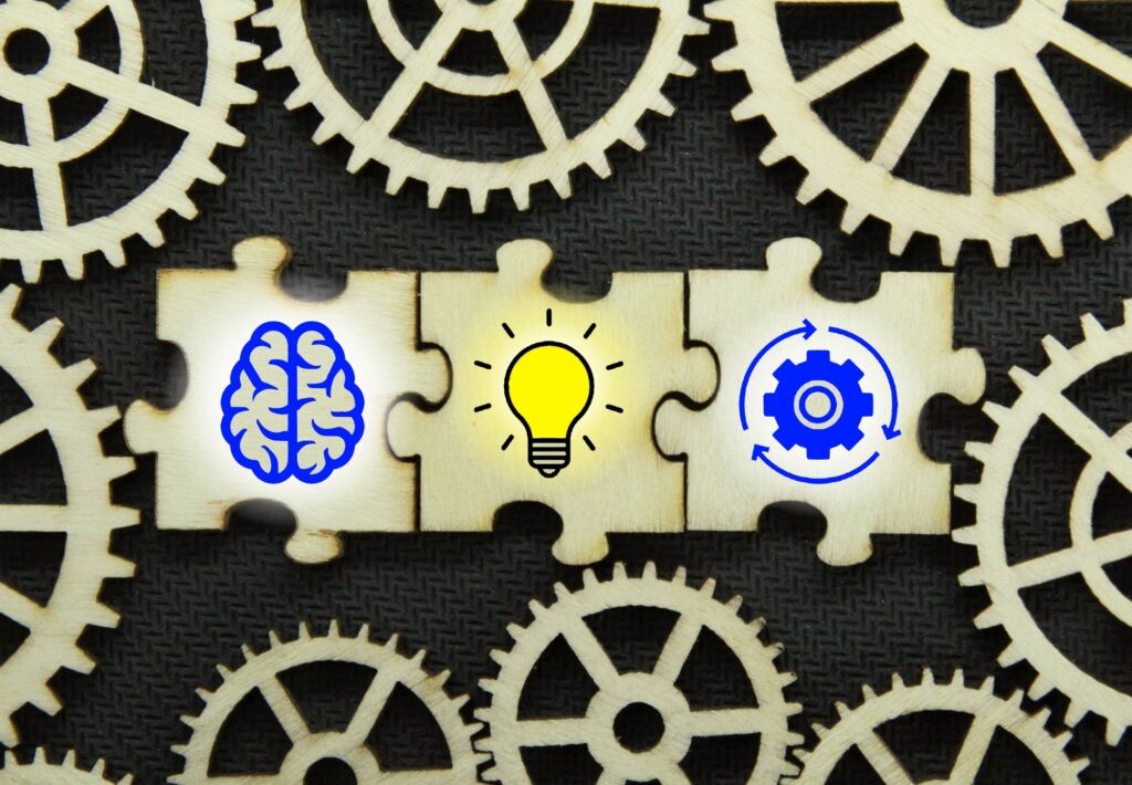 puzzle with brain, idea and management icons.